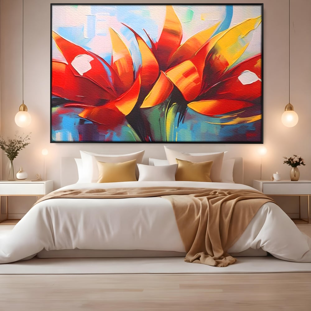 Tablou canvas cu pictura abstracta cu flori portocalii, in rama de aluminiu negru, pe perete intr-un dormitor